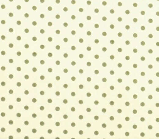 Cream cotton poplin fabric with 3mm green spots by Rose & Hubble